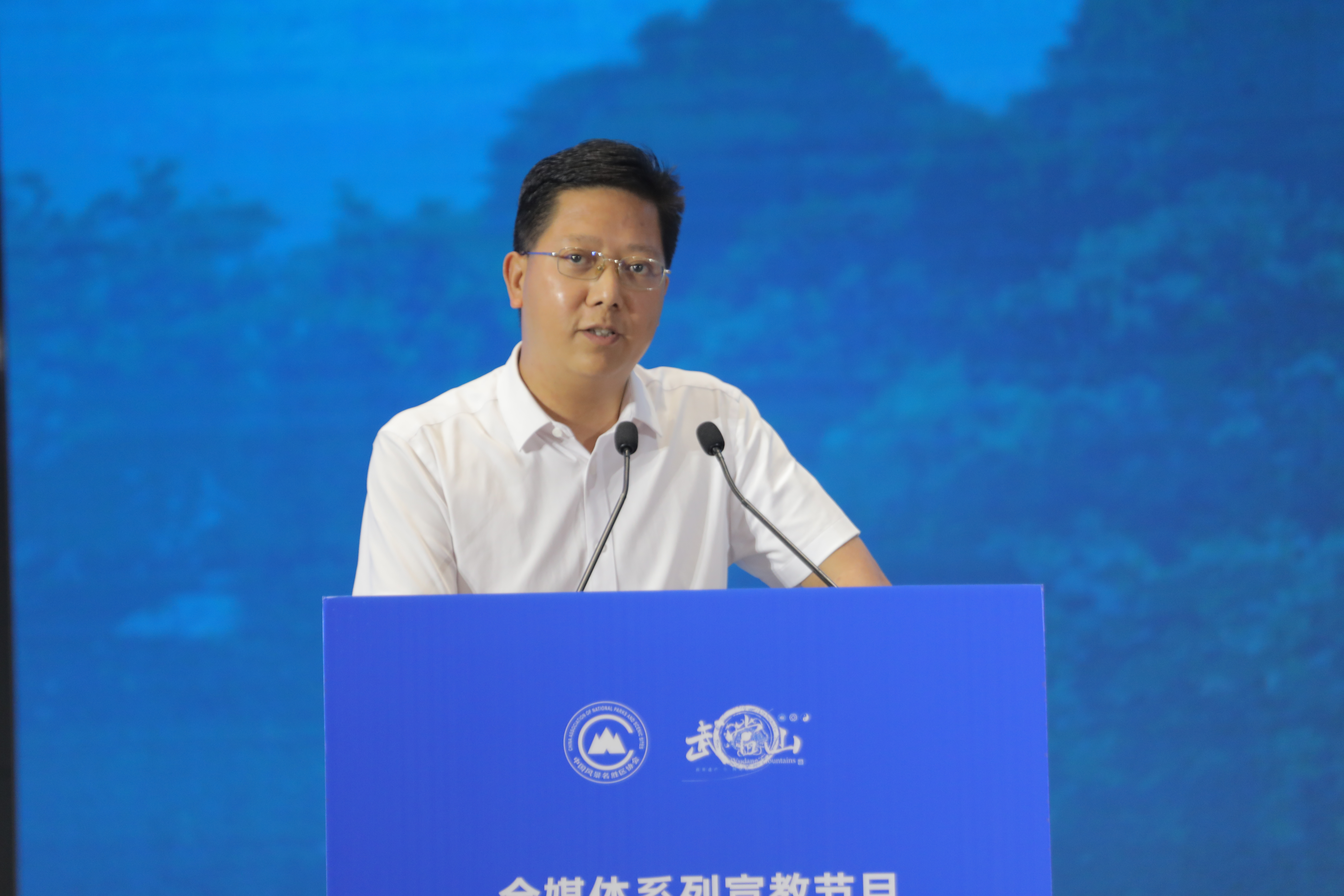 微信图片_20260604195803-张震.jpg